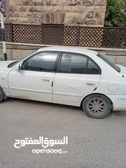  6 سيارة هونداي فيرنا 2003ميكانيكيات جيدة جدا وعيوب بسيطة بالبودي