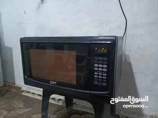  2 ميكرويف سونا 45لتر لون اسود مع نظام شواي داخليه بحال الوكاله قابل للتفاوض يوجد توصيل