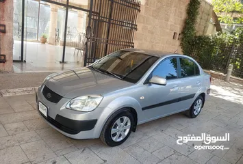  14 كيا ريو موديل 2009 بنزين اتوماتيك
