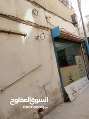  8 عمارة وسط السوق التجاري بين شارع السعادة وشارع الملك عبدالله