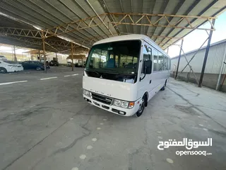  2 باص متسوبيشي فوسو حره غير مجمرك 26 راكب ماتور كهرباء