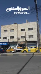  13 مجمع تجاري للإيجار بدون خلو في موقع مميز في الزرقاء حي معصوم الشارع الرئيسي جوار دوار معصوم