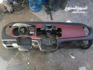  2 قشره تابلو وجحش وسط كامل كيا فورتي ميوزك بتركب من موديل 2010 /2013 وكاله مع البصمه واليرباق