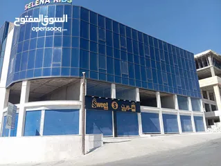  3 مخازن ومكاتب تجاريه للإيجار في أقوى شارع تجاري في الزرقاء الجديده شارع الكرامه (الوينك)