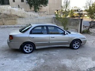  1 كيا سبكترا 2001 MR بحاله ممتازه