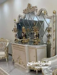  1 السلام عليكم  موجود طاولة سفره مع 8كراسي +دنسوار خشب زان ثقيله نفس الي بالصورة بس الموجودة خشب غير م