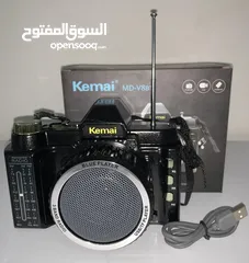  1 راديو على شكل كاميرا (سماعة + بلوتوث +AUX +USB +TF)