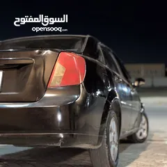  6 شيفروليه اوبترا 2009 اسود 1600cc