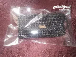  12 حقيبة يد نسائية مصنوعة من حب  اللولو الأسود من افخم  انواع اللولو صناعة ممتازة متينة حجمها متوسط