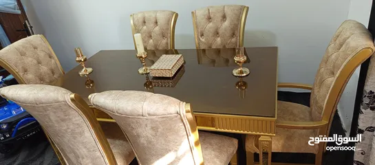  1 طاوله سفرة ملوكيه تفصيل لون ذهبي خشب زان ولاتيه