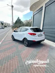  2 جب هونداي توسان موديل2014  لون ابيض ماشي 100الف مالك واحد  فل لفل عدا فتحة الجب كرتونة