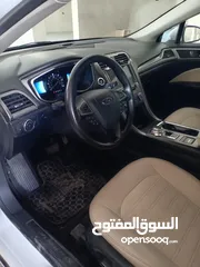  1 فورد فيوجن SE فل كامل فحص كامل مقاعد كهرباء مقاعد جلد فتحه فسقف والعديد من المواصفات سياره ممشى قليل