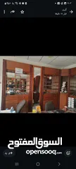  8 ديكور خشب بلوط يصلح لمحل عطور بصريات خلويات