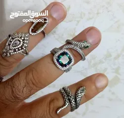  4 خواتم فضه مطعمه بالحجر الكريم