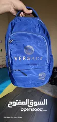  1 original.varsace shoulder bag used mint condition( exchange ok to luxury watch)