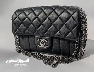  1 Chanel Black Quilted multi chain Flap Handbag