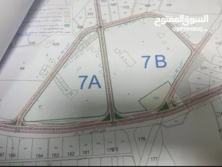  2 10 دونم على شارع المية امام المدينة الرياضية الجديدة مباشرة