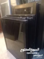  9 شبابيك المنيوم لون برونز زجاج برونز متوفر عدة مقاسات  بحال الوكاله