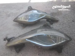  1 كشافات سوناتا2013 واضويه ميتسوبيشي 98 وكيا2 كشافات وقطع للبيع