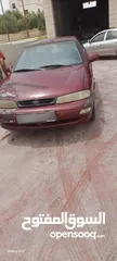  3 كيا سيفيا 1 لون خمري قير عادي