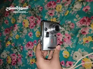  1 كاميرا اولمبس  c-60زوم