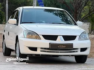  3 ميتسوبيشـــــي لانســــر GLX 2011 وارد الكويت مميزة جدا للبيع بسعر مغري