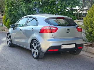  4 كيا ريو 2015 فل اوبشن كامل مع فتحة اعلى مواصفات فحص كامل 7 جيد دون اي ملاحظة قطعت مسافة 100 الف كم