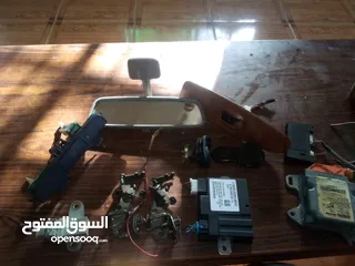  1 قطع سيارات لقمتين ابواب وا كبسة رباعي لمتسوبيشي لانسر  وكمبيوتر مرسيدس  منضم البنزين