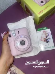  12 كمره تصوير فوريه  بلون الوردي  مع 10 أفلام لتصوير pink colour instax mini 12 camera with 10 film