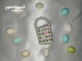  19 ميداليات واساور وتوزيعات أعراس وحقائب من الخرز