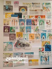  13 طوابع اصلية من كل بلدان العالم للبيع المستعجل الطابع ب دينار