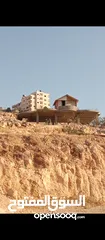  8 ارض مع منزل عظم للبيع في دار صلاح