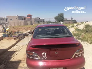  18 بسم الله الرحمن الرحيم  هونداي / افانتي موديل 95 لون خمري دم الغزال  جير عادي   فحص/خالي قص
