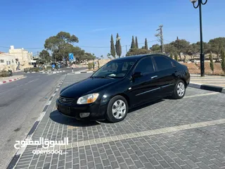  15 كيا سيراتو 2008 ماتور 1600 بنزين اوتومات عدد 2 لون ابيض ولون اسود