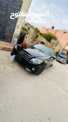  1 مرسيدس c200 2009 ترخيص 12 فل اضافات عدا فتحة  موتور 1800ccبنزين  تعديل خارجي كامل AMG