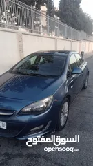  2 أوبل أسترا 2015 أوتاماتيك ماتور 1400 سي سي تيربو فتحة بالسقف لون أزرق
