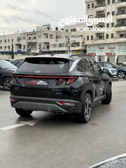  13 هونداي توسان ترخيص 2022 محرك 1600 هايبرد plug in/يقطع على الشحنه 65 كيلو متر  جير أوتوماتيك