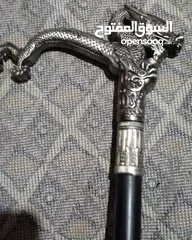  2 عكازة  برأس تنين مع سيف