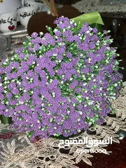  9 كل مايلزم مسكات العرائس وباقات الورد الصناعي