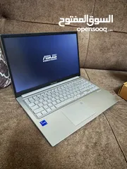  5 Asus Vivobook i7-13th gen بحالة الوكالة تماما