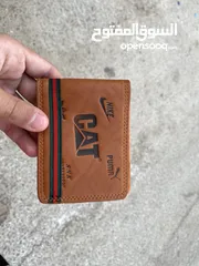  1 محفظه رجاليه فخمه فقط بثلث دنانير