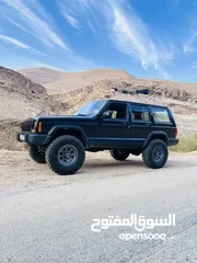  5 للبيع - جيب شيروكي XJ موديل 1999  جاهز للبر والمغامرات!