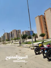  1 محل تجاري في منطقه 390 فدان في حداىق أكتوبر بجوار ابني بيتك السابعه و مشروع 557 عماره