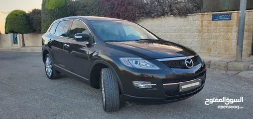  1 مازدا CX9 موديل 2008 مميزة توب نضافة صيانة شركة لون اسود استخدام شخص واحد
