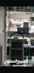  2 ديكور معرض اكسسوارات وصيانة اجهزة حاسوب- الديكور كامل من خزائن وتعليق ورفوف
