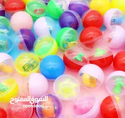  28 طابات مجنونة مطاطية و كبسولات هدايا للماكينات بالعملة