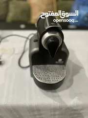  1 مكينة Nespresso