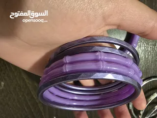  3 اساور بلاستيك بنفسجي، وفضي عدد 15