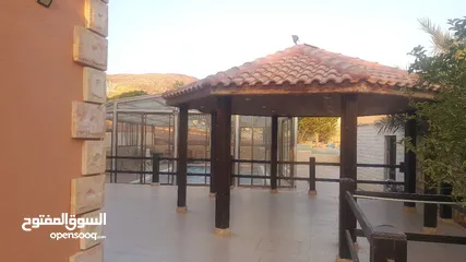  23 للبيع شاليه السلط حوض الخيمه التحته مساحة الارض4 دونم مساحة البناء 280 مع بركة سباحه السعر 140الف