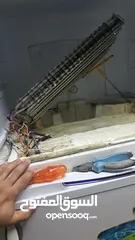  2 تصليح ثلاجات وغسلات والغازات